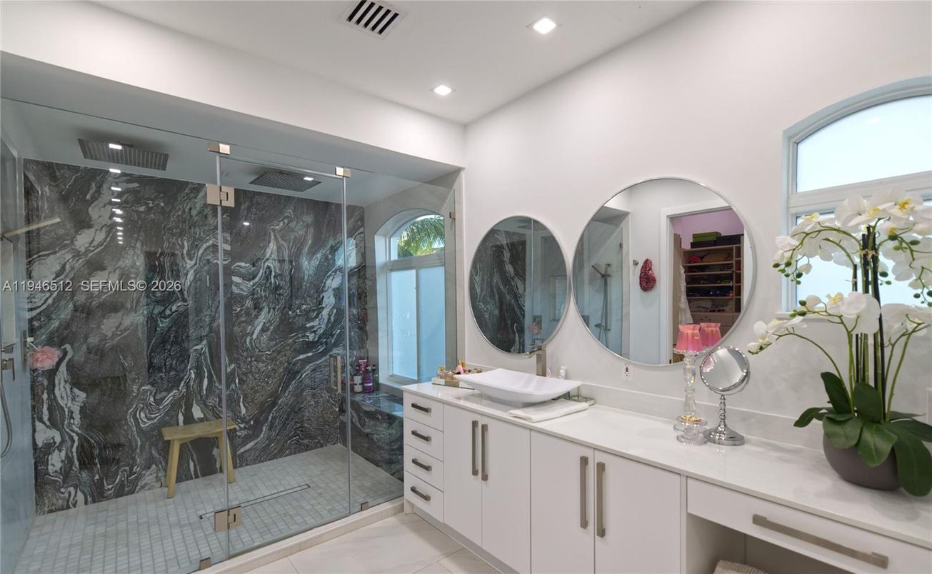 Bathroom, Dual Sink Vanities, Glass Shower, Interior, Marble Walls, Recessed Lighting