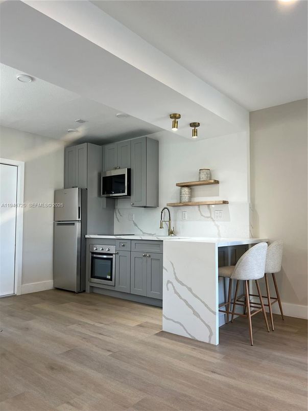 Interior, Kitchen, Marble Walls, Recessed Lighting, Wood Texture Flooring