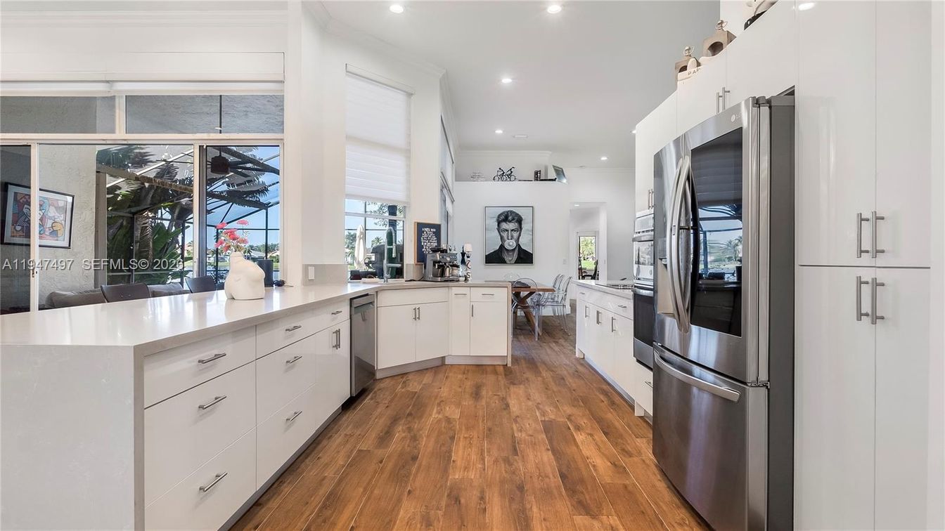 Dining room, Interior, Kitchen, Recessed Lighting, Stainless Steel Appliances, Wood Texture Flooring