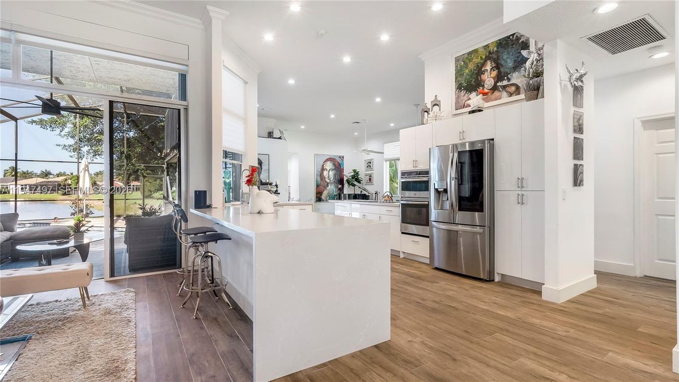 Interior, Kitchen, Recessed Lighting, Stainless Steel Appliances, Water, Wood Texture Flooring