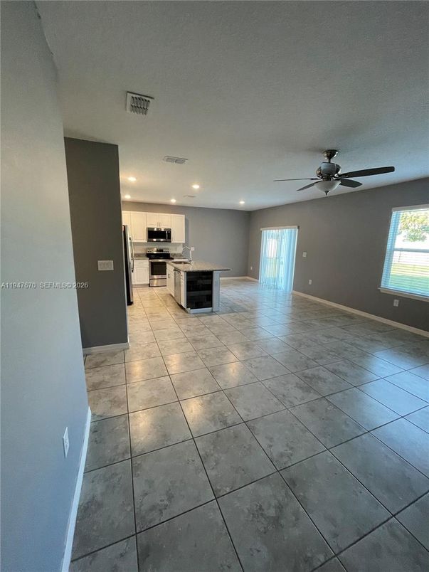 Empty room, Interior, Kitchen, Recessed Lighting, Stainless Steel Appliances