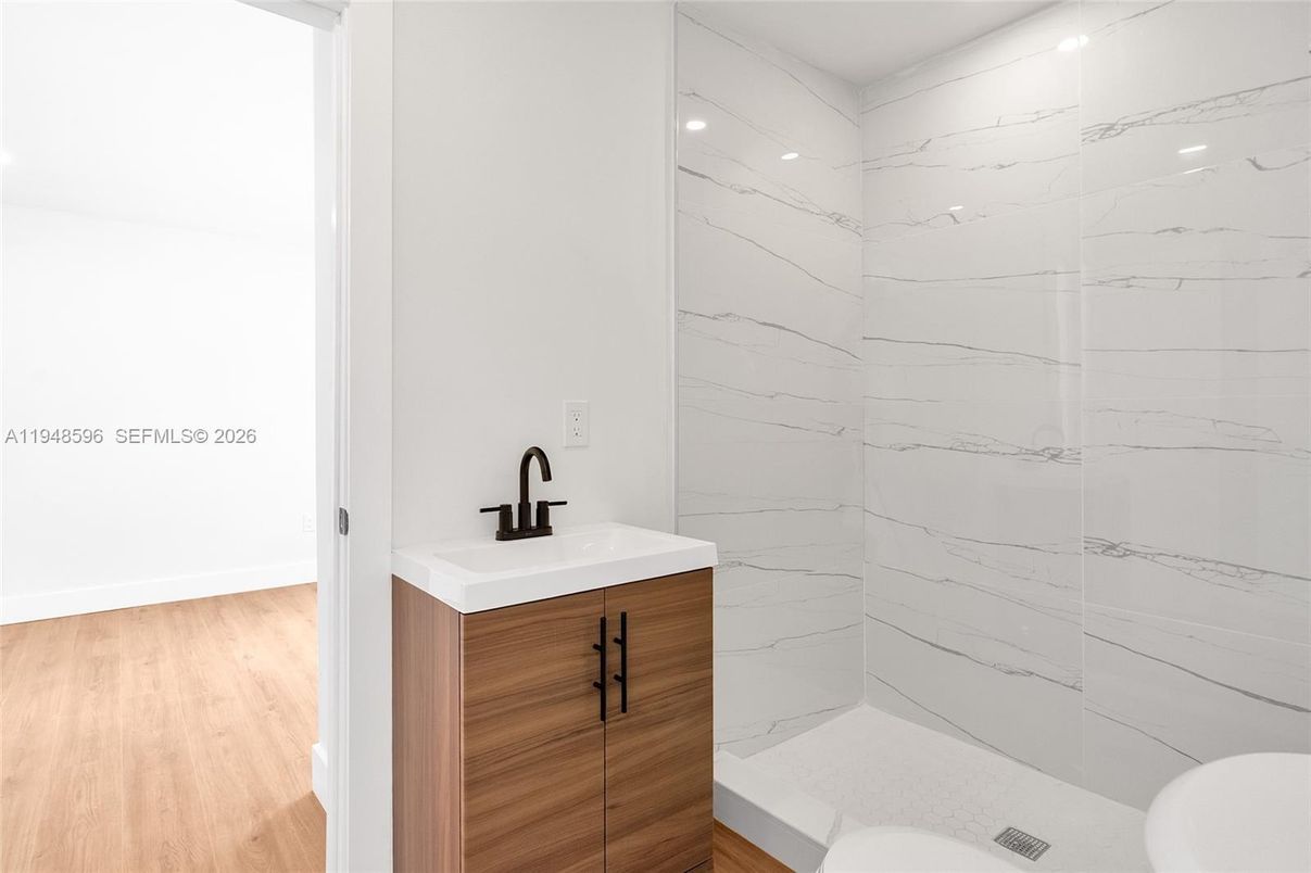 Bathroom, Interior, Marble Walls, Recessed Lighting, Wood Texture Flooring