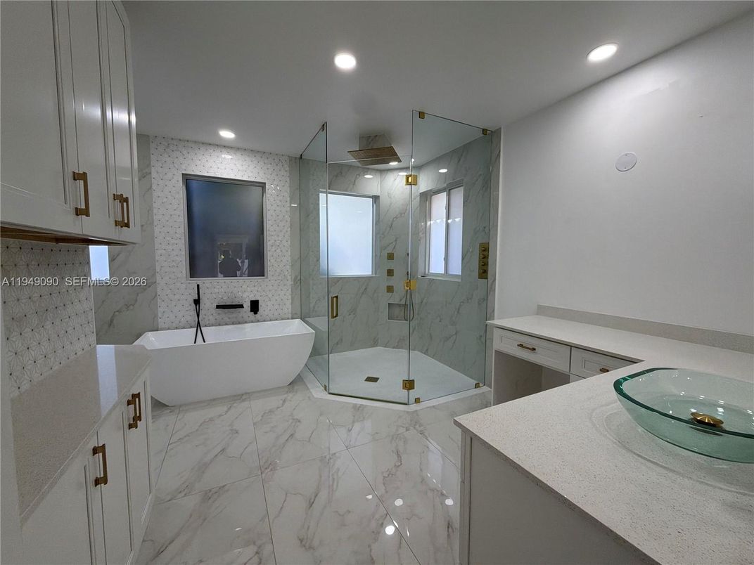 Bathroom, Dual Sink Vanities, Free Standing Baths, Glass Shower, Interior, Marble, Marble Walls, Recessed Lighting