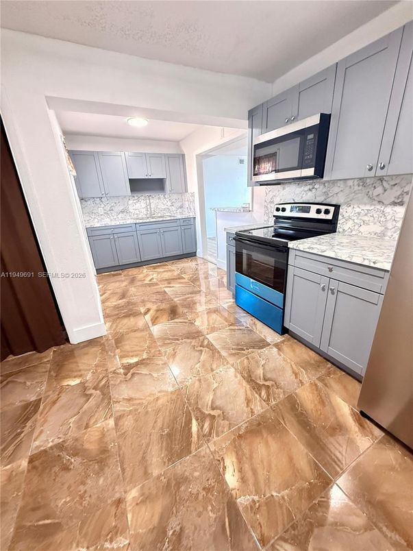 Interior, Kitchen, Marble Walls, Stainless Steel Appliances