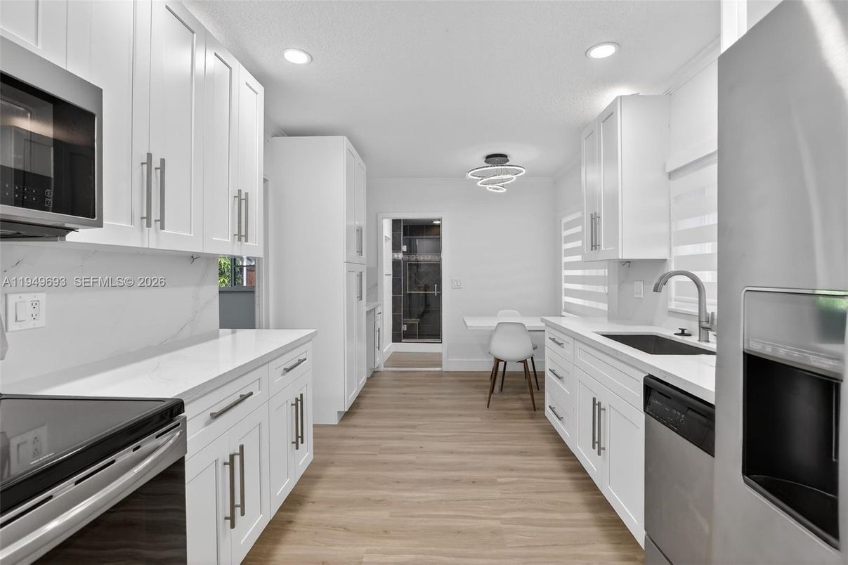 Interior, Kitchen, Pendant Lights, Recessed Lighting, Stainless Steel Appliances, Wood Texture Flooring