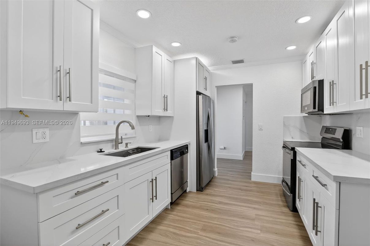 Interior, Kitchen, Recessed Lighting, Stainless Steel Appliances, Wood Texture Flooring