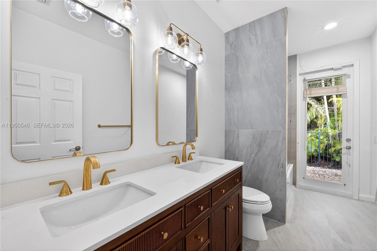 Bathroom, Dual Sink Vanities, Interior, Marble, Marble Walls, Recessed Lighting