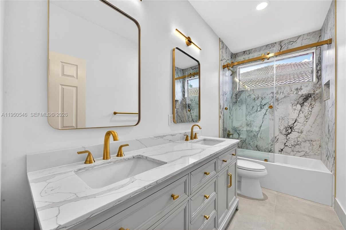 Bathroom, Dual Sink Vanities, Glass Shower, Interior, Marble Walls, Recessed Lighting