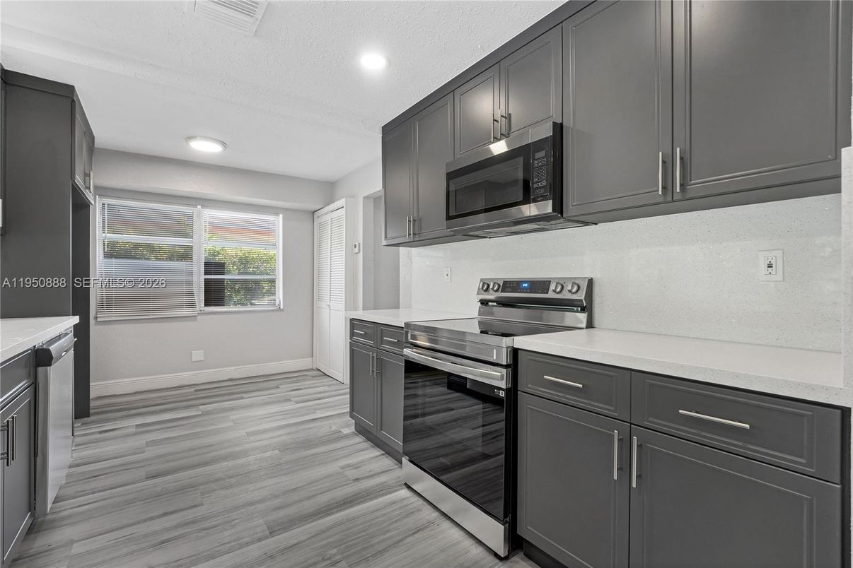 Interior, Kitchen, Recessed Lighting, Stainless Steel Appliances, Wood Texture Flooring