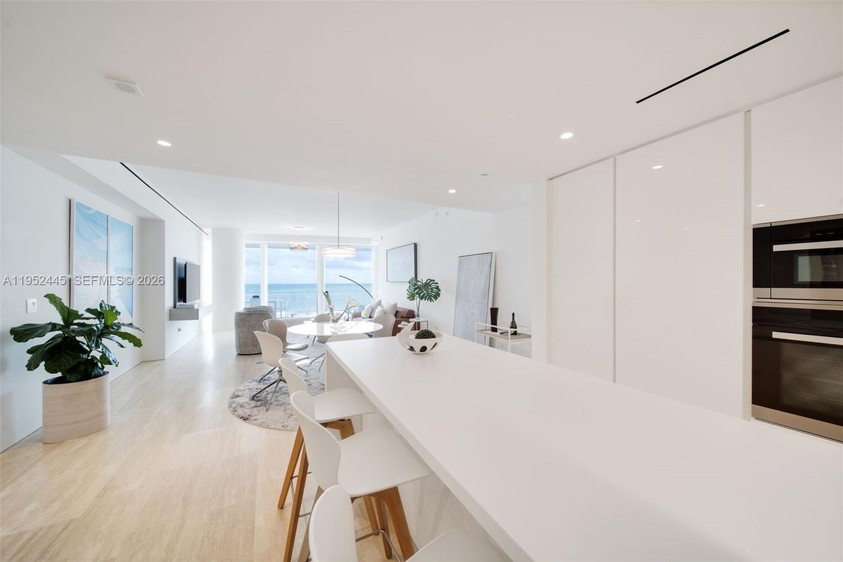 Dining room, Interior, Kitchen, Pendant Lights, Recessed Lighting, Stainless Steel Appliances, Water, Wood Texture Flooring