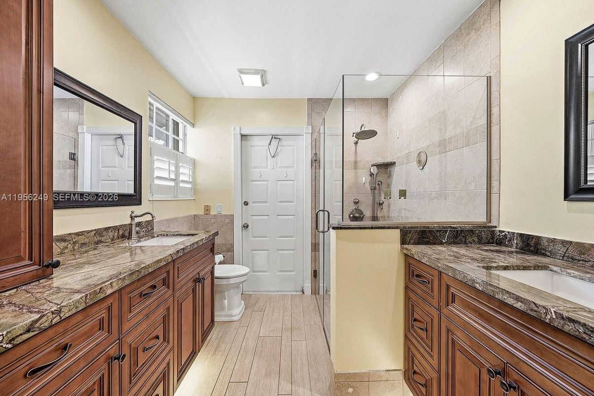 Bathroom, Dual Sink Vanities, Glass Shower, Interior, Wood Texture Flooring