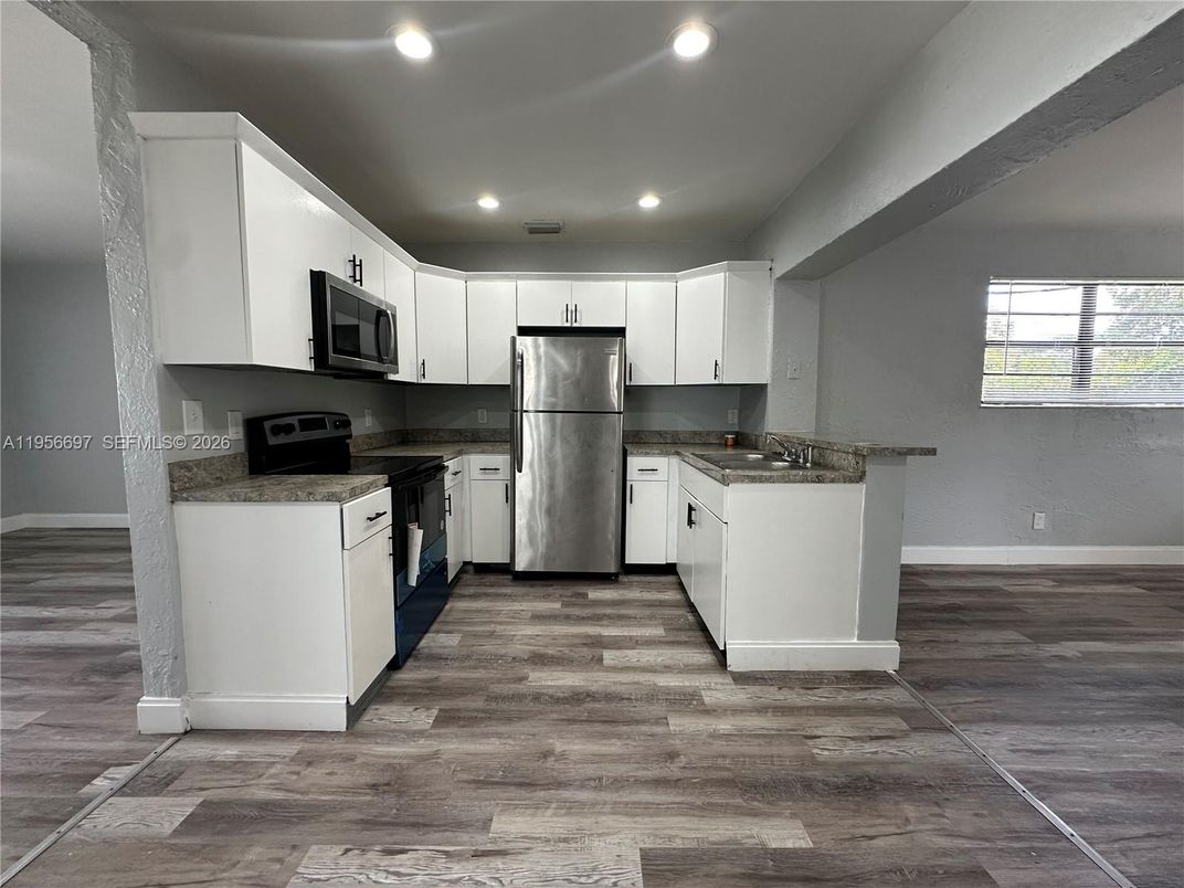 Interior, Kitchen, Recessed Lighting, Stainless Steel Appliances, Wood Texture Flooring