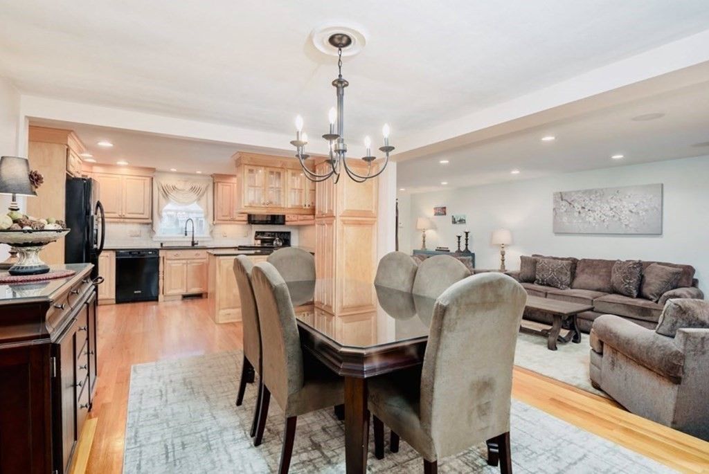 Chandelier, Dining room, Interior, Kitchen, Living room, Recessed Lighting, Stainless Steel Appliances, Wood Texture Flooring