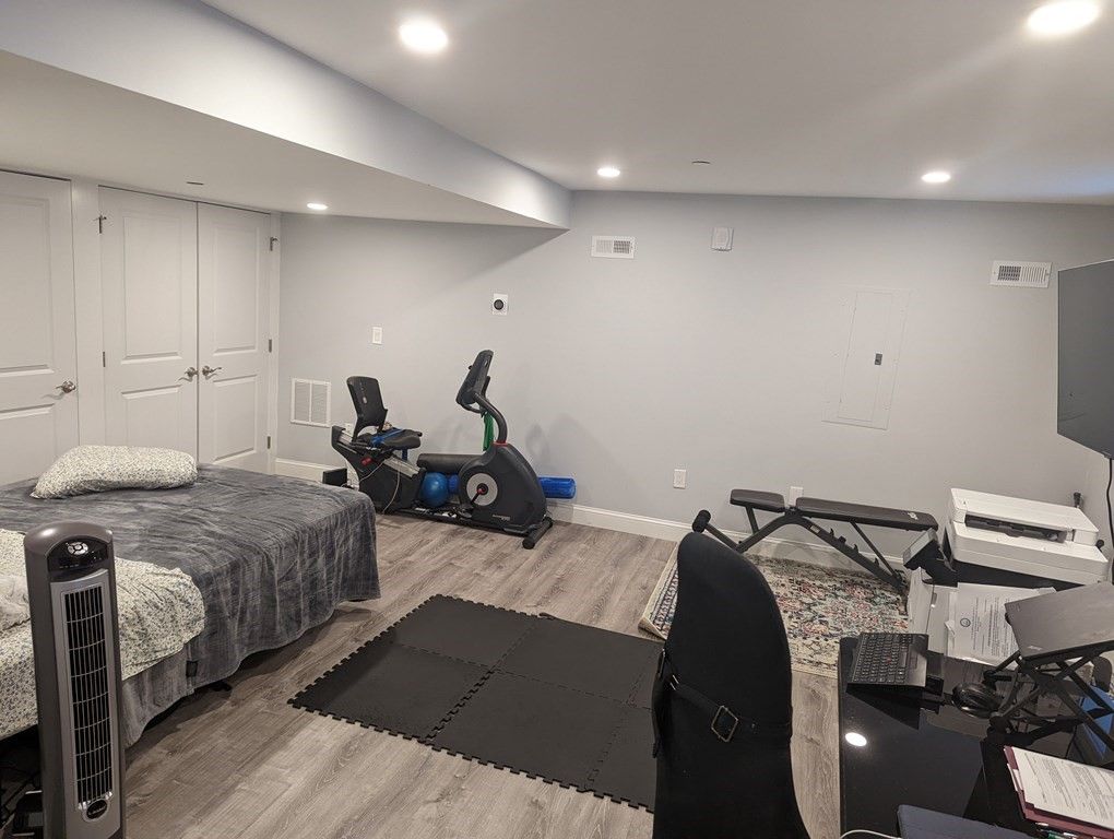Bedroom, Fitness Equipment, Interior, Recessed Lighting, Wood Texture Flooring