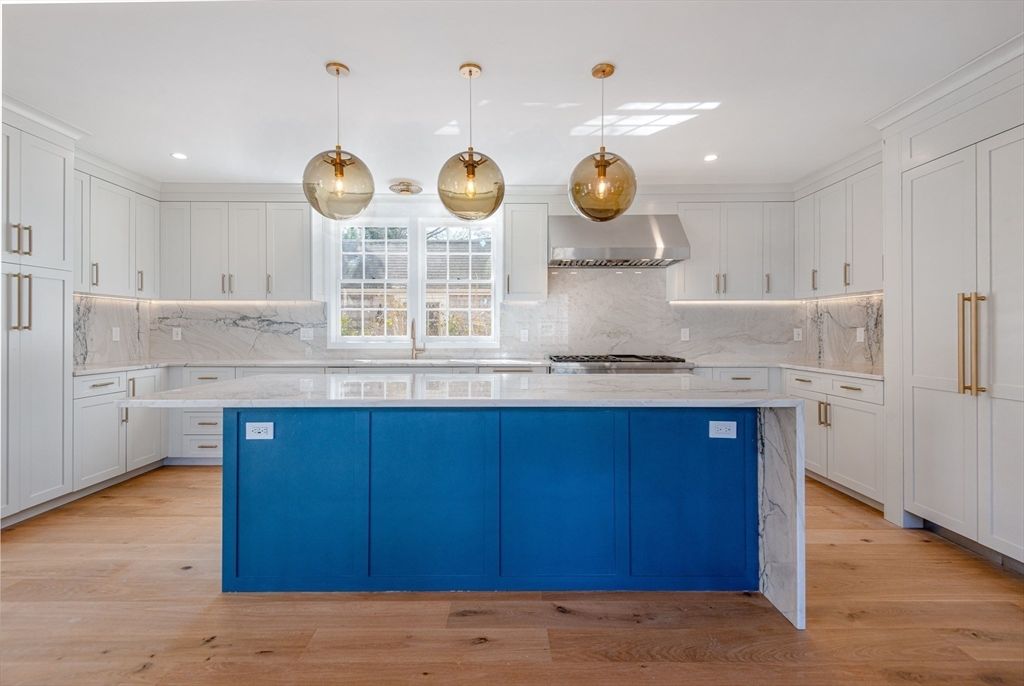 Interior, Kitchen, Marble Walls, Pendant Lights, Recessed Lighting, Stainless Steel Appliances, Wood Texture Flooring