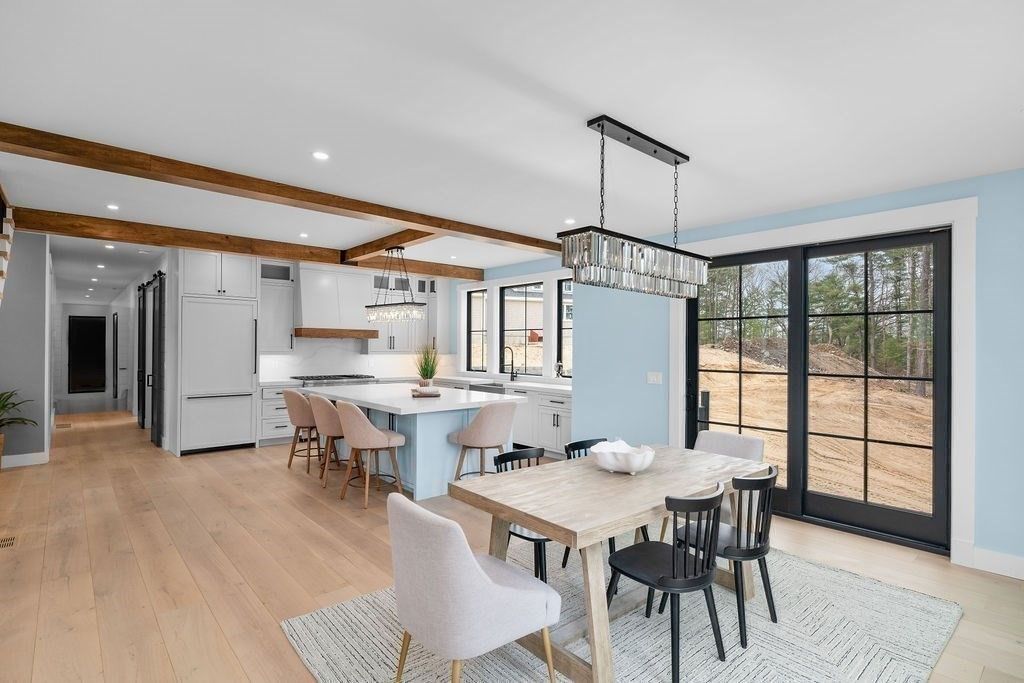 Chandelier, Dining room, Interior, Kitchen, Pendant Lights, Recessed Lighting, Stainless Steel Appliances, Wooden Beams, Wood Texture Flooring