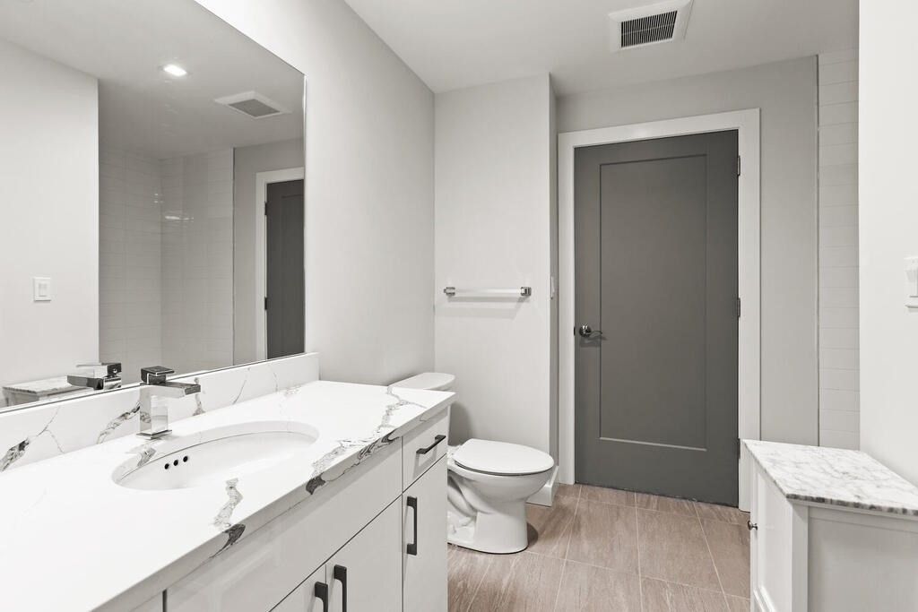 Bathroom, Dual Sink Vanities, Interior, Recessed Lighting, Wood Texture Flooring