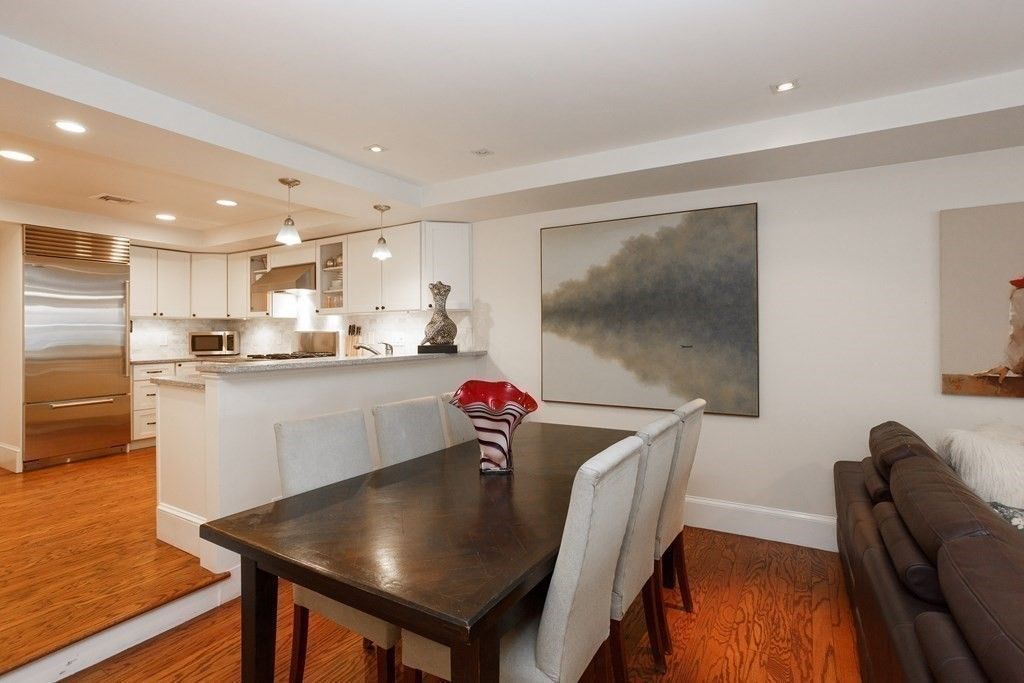 Dining room, Interior, Kitchen, Pendant Lights, Recessed Lighting, Stainless Steel Appliances, Wood Texture Flooring