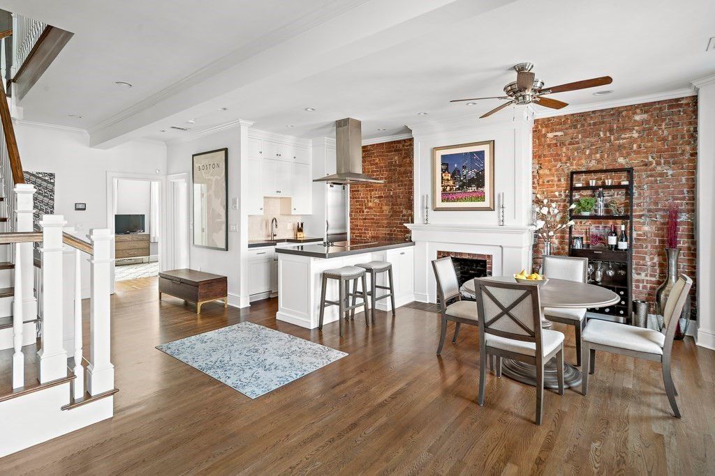 Dining room, Fireplace, Interior, Kitchen, Recessed Lighting, Stone Walls, Wood Texture Flooring