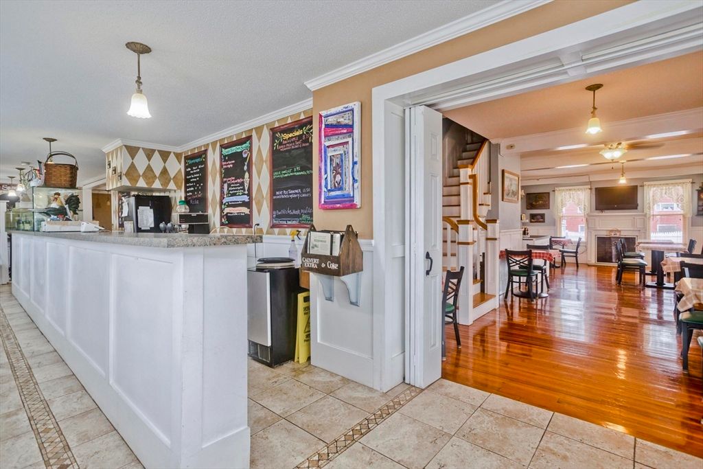 Dining room, Fireplace, Interior, Pendant Lights, Wood Texture Flooring