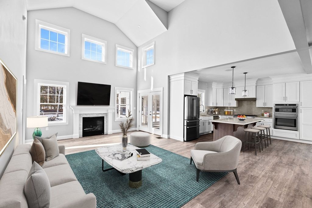 Fireplace, Interior, Kitchen, Living room, Pendant Lights, Stainless Steel Appliances, Wood Texture Flooring