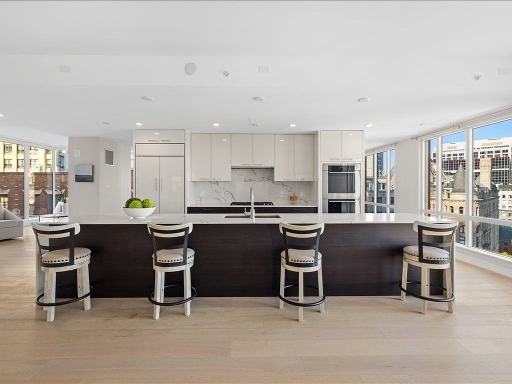 Interior, Kitchen, Marble Walls, Recessed Lighting, Stainless Steel Appliances, Wood Texture Flooring