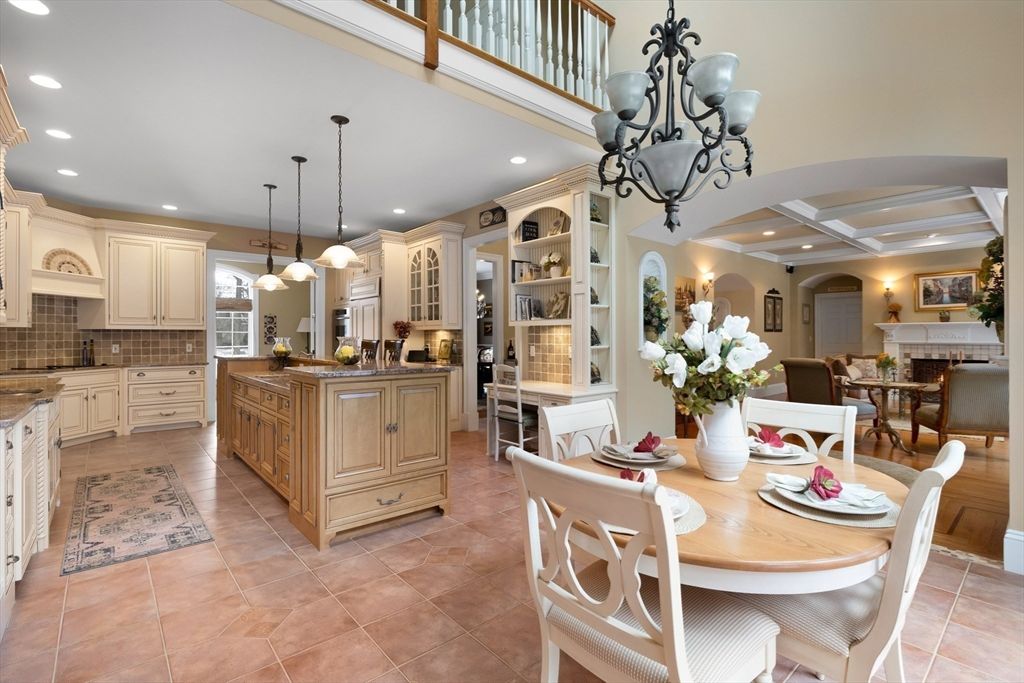 Chandelier, Dining room, Fireplace, Interior, Kitchen, Pendant Lights, Recessed Lighting, Stainless Steel Appliances