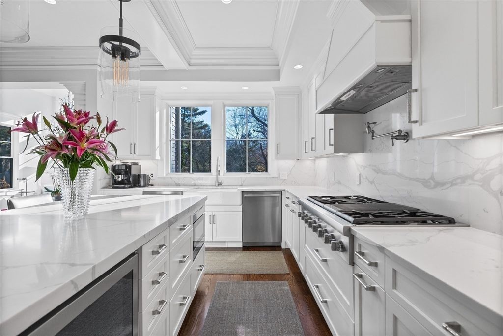 Interior, Kitchen, Marble Walls, Pendant Lights, Recessed Lighting, Stainless Steel Appliances, Wood Texture Flooring
