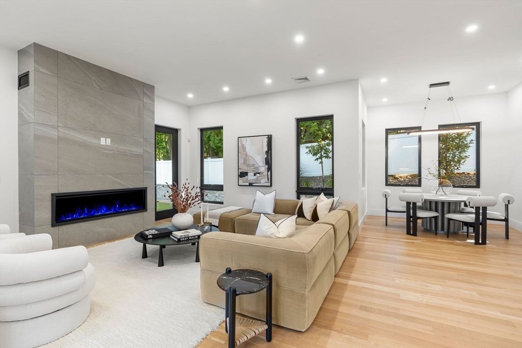 Dining room, Fireplace, Interior, Living room, Pendant Lights, Recessed Lighting, Wood Texture Flooring