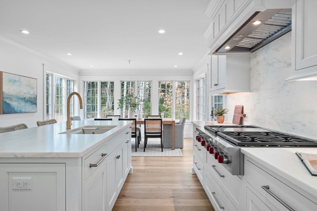 Dining room, Interior, Kitchen, Marble Walls, Recessed Lighting, Stainless Steel Appliances, Wood Texture Flooring