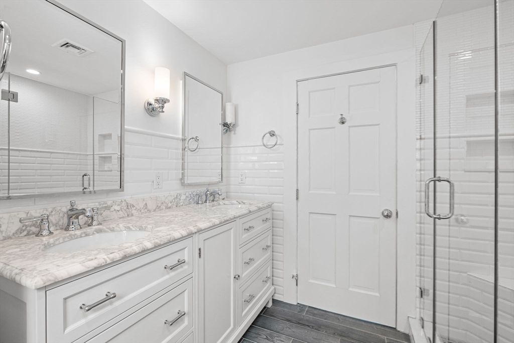 Bathroom, Dual Sink Vanities, Glass Shower, Interior, Recessed Lighting, Wood Texture Flooring
