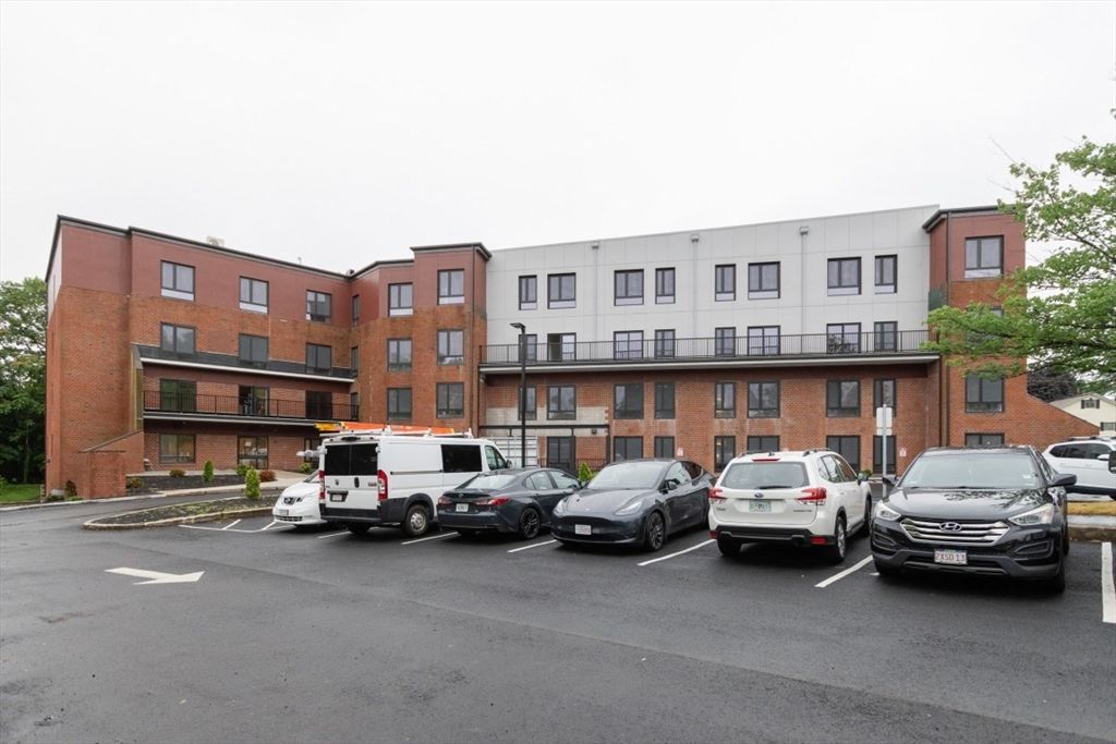 Exterior, Facade, Brick Facade, Condo Building