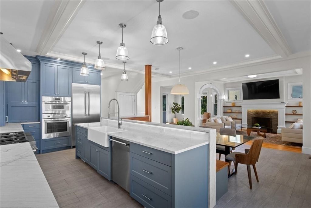 Dining room, Fireplace, Interior, Kitchen, Living room, Pendant Lights, Recessed Lighting, Stainless Steel Appliances, Wood Texture Flooring