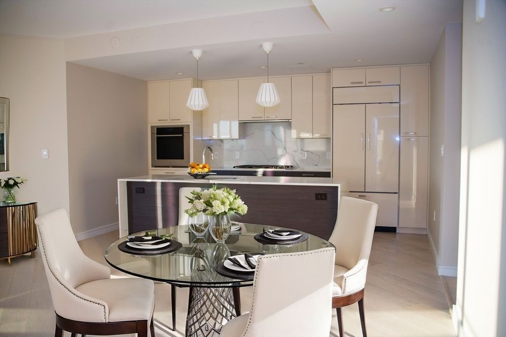 Dining room, Interior, Kitchen, Pendant Lights, Recessed Lighting, Stainless Steel Appliances, Wood Texture Flooring