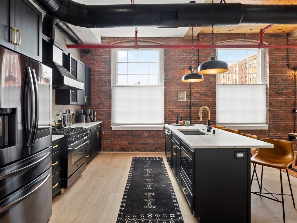 Interior, Kitchen, Pendant Lights, Stainless Steel Appliances, Stone Walls, Wood Texture Flooring