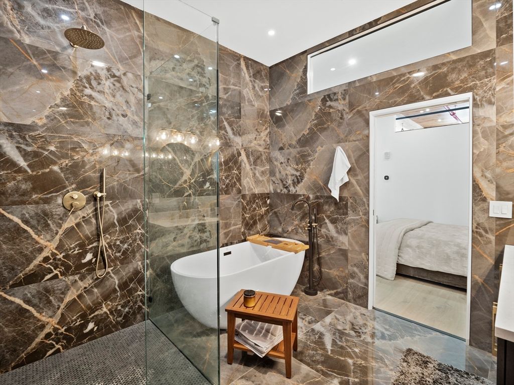 Bathroom, Free Standing Baths, Glass Shower, Interior, Marble Walls, Recessed Lighting
