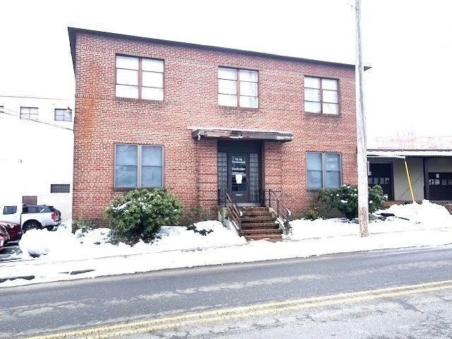 Exterior, Facade, Brick Facade, Condo Building