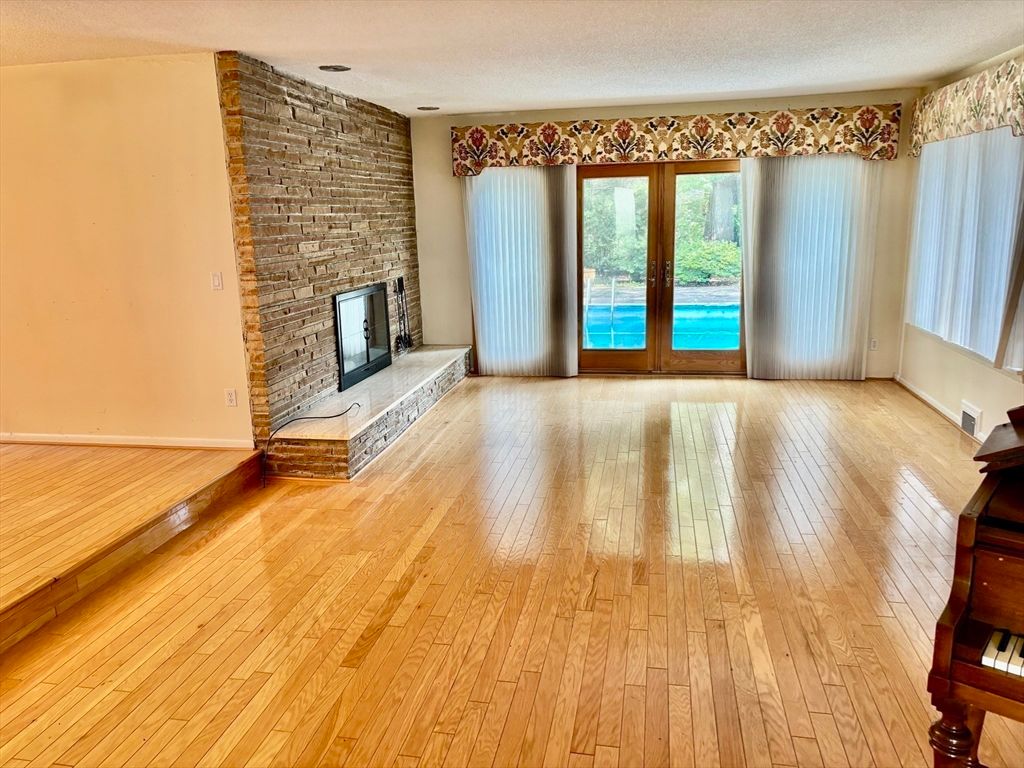 Empty room, Fireplace, Interior, Stone Walls, Wood Texture Flooring