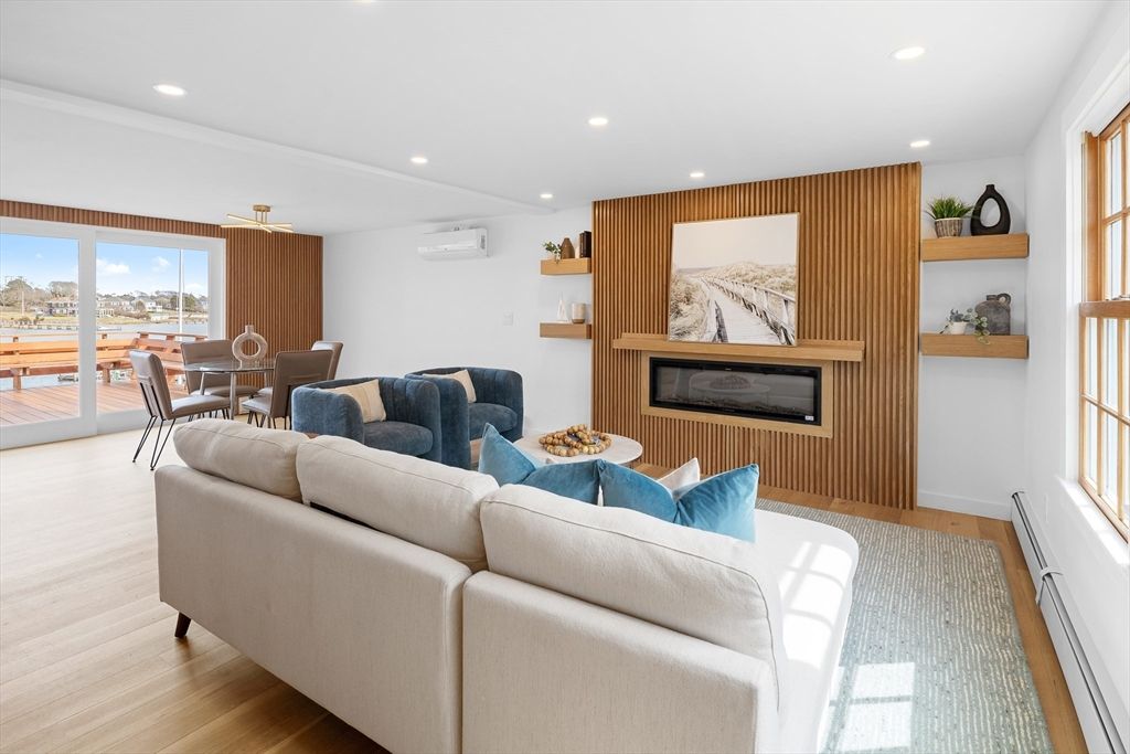 Dining room, Fireplace, Interior, Living room, Recessed Lighting, Wood Texture Flooring