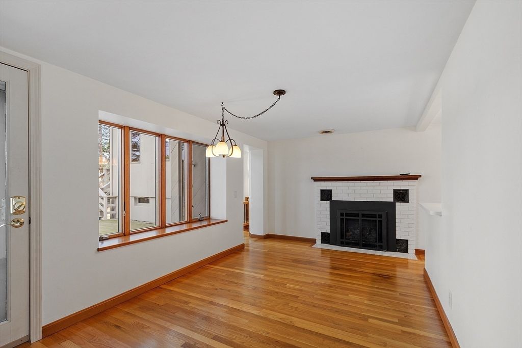 Empty room, Fireplace, Interior, Pendant Lights, Wood Texture Flooring