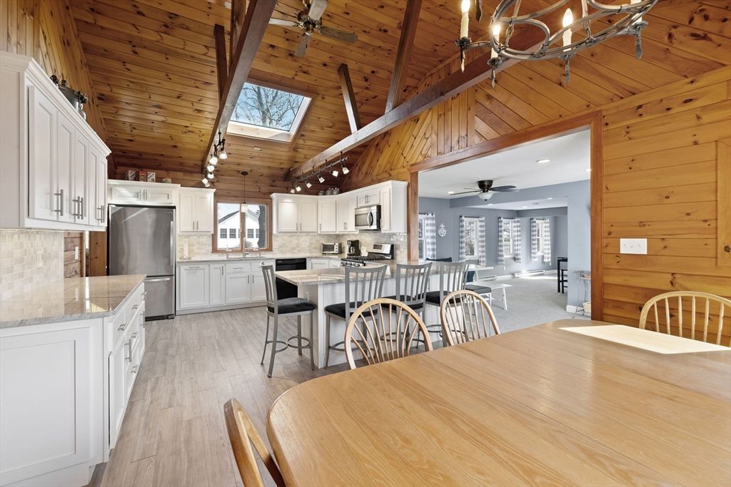 Chandelier, Dining room, Interior, Kitchen, Recessed Lighting, Stainless Steel Appliances, Wooden Beams, Wooden Ceilings, Wood Texture Flooring, Wooden Walls