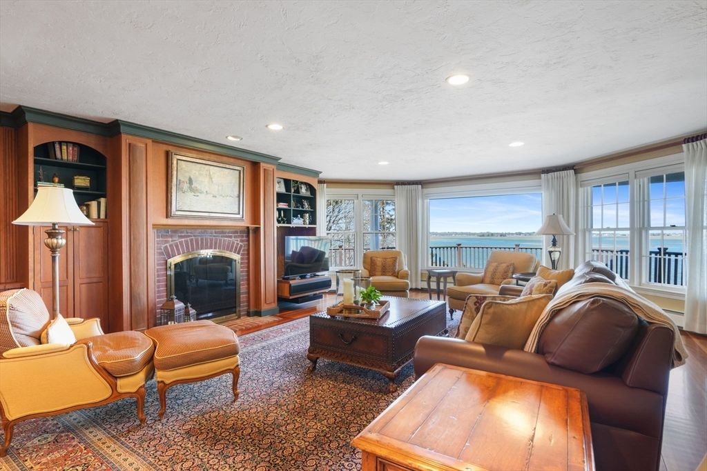 Fireplace, Interior, Living room, Recessed Lighting, Water, Wood Texture Flooring