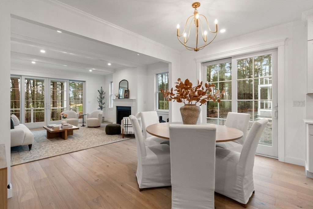 Dining room, Fireplace, Interior, Living room, Pendant Lights, Recessed Lighting, Wood Texture Flooring