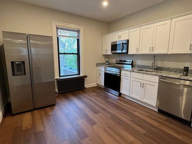 Interior, Kitchen, Recessed Lighting, Stainless Steel Appliances, Wood Texture Flooring