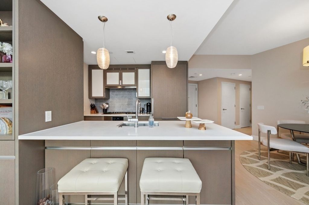 Dining room, Interior, Kitchen, Pendant Lights, Recessed Lighting, Stainless Steel Appliances, Wood Texture Flooring