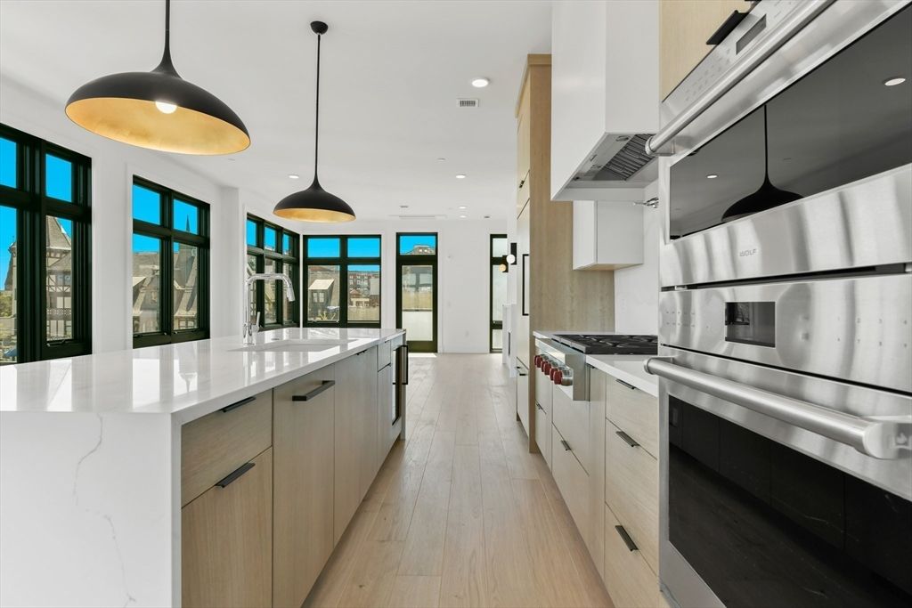 Interior, Kitchen, Pendant Lights, Recessed Lighting, Stainless Steel Appliances, Wood Texture Flooring