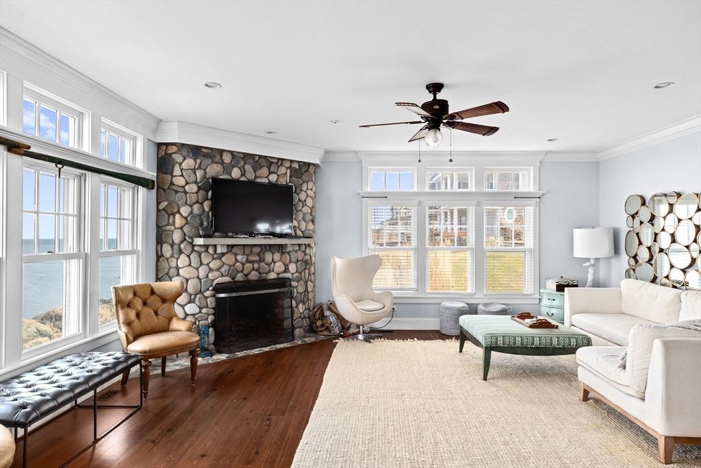 Fireplace, Interior, Living room, Recessed Lighting, Stone Walls, Wood Texture Flooring