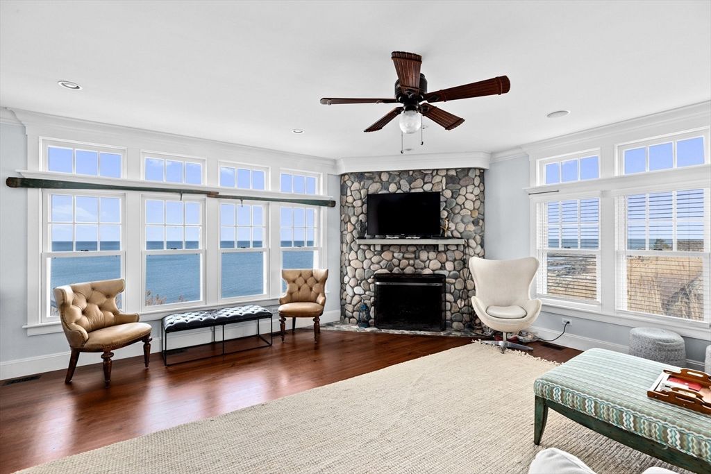 Fireplace, Interior, Recessed Lighting, Stone Walls, Water, Wood Texture Flooring