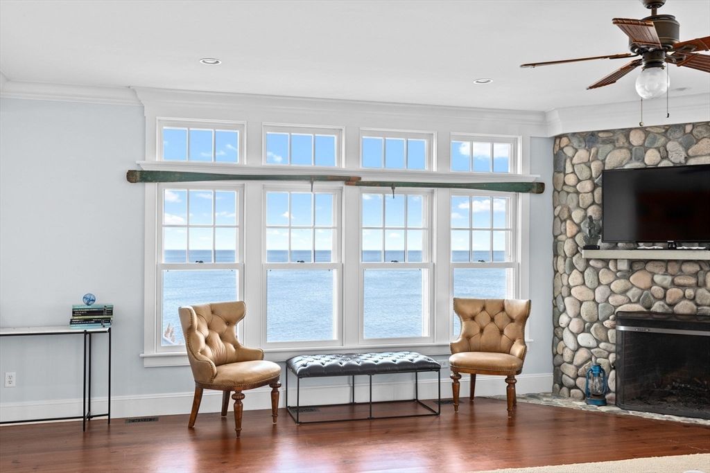 Fireplace, Interior, Recessed Lighting, Stone Walls, Water, Wood Texture Flooring