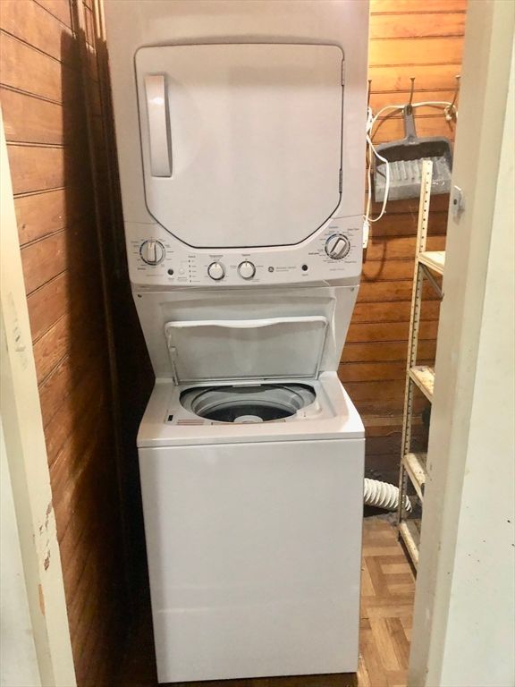 Interior, Utility Closets, Washer, Wood Texture Flooring, Wooden Walls